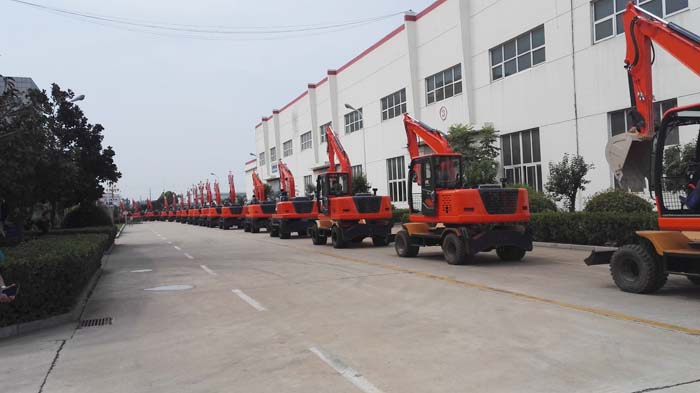 熱烈祝賀沃爾華集團 60台轮式挖掘机批量出口泰國